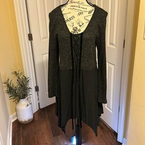 Great layering piece Mona Reno size medium light, gray, used but slightly worn